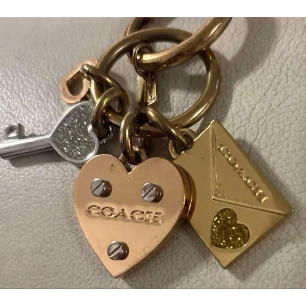 Vintage coach gold heart charm